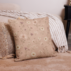 Rose Meadow reversible pillow cover with blush wildflowers, daisies, greenery, and warm rose-clay reverse.